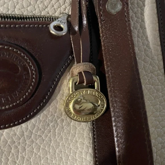 Dooney & Bourke Cream Pebbled Tote with Brown Leather Trim and Gold Hardware - Picture 7 of 8